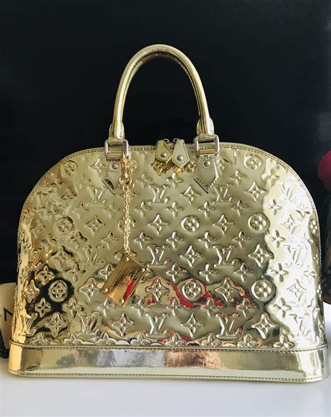 lv bag with gold plate|authentic louis vuitton leather bags.